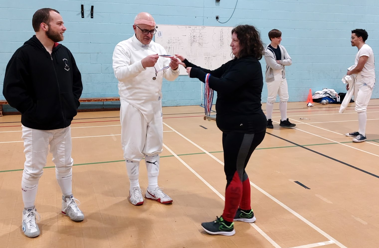 Dominic receiving his medal